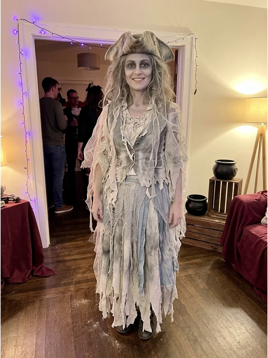 Ghost Pirate Costume. Wear distressed white, gray, and pale blue clothing layered like a traditional pirate outfit. Add pale makeup, gray eye shadow, tangled hair, and translucent