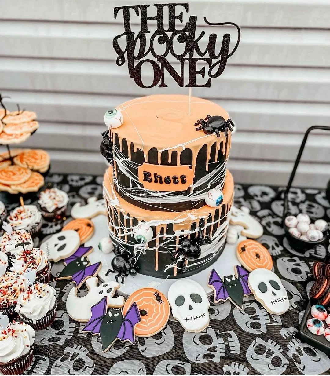 Layered Drip Cake Display spooky one first birthday