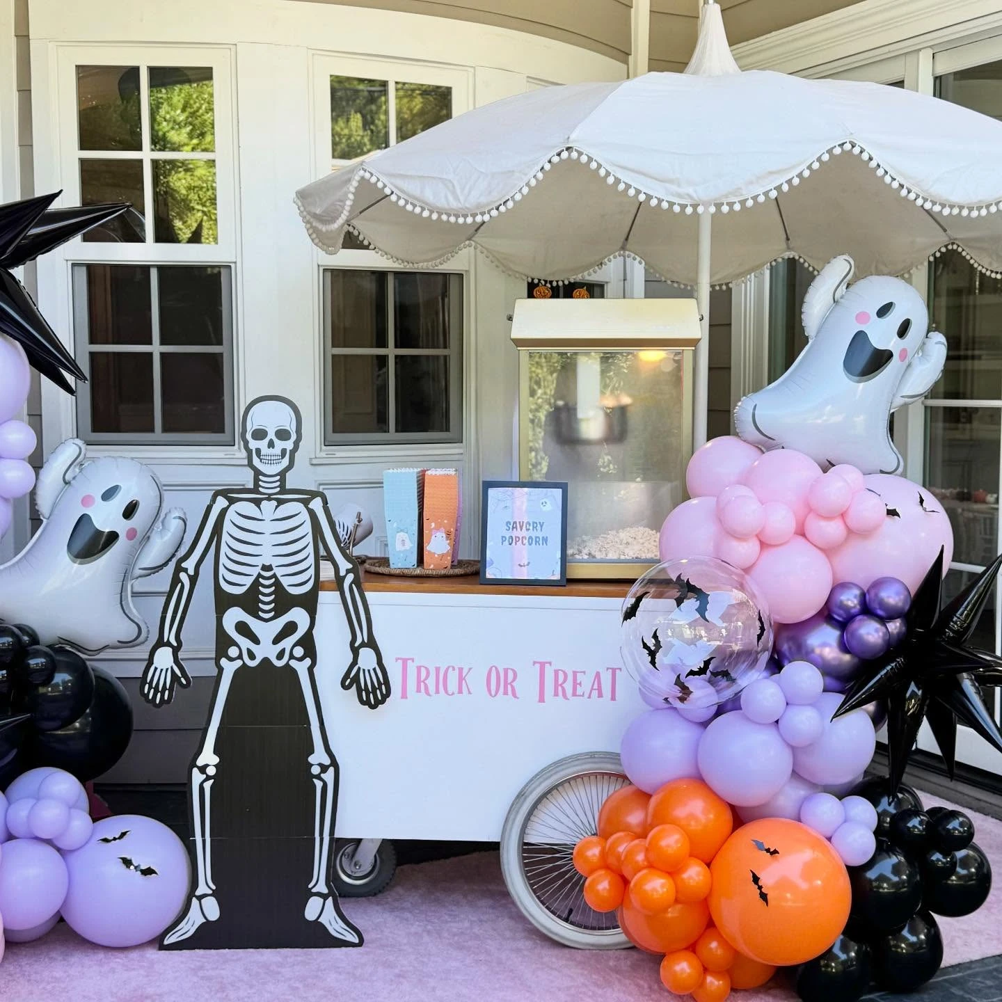Whimsical Popcorn Snack Station spooky one first birthday