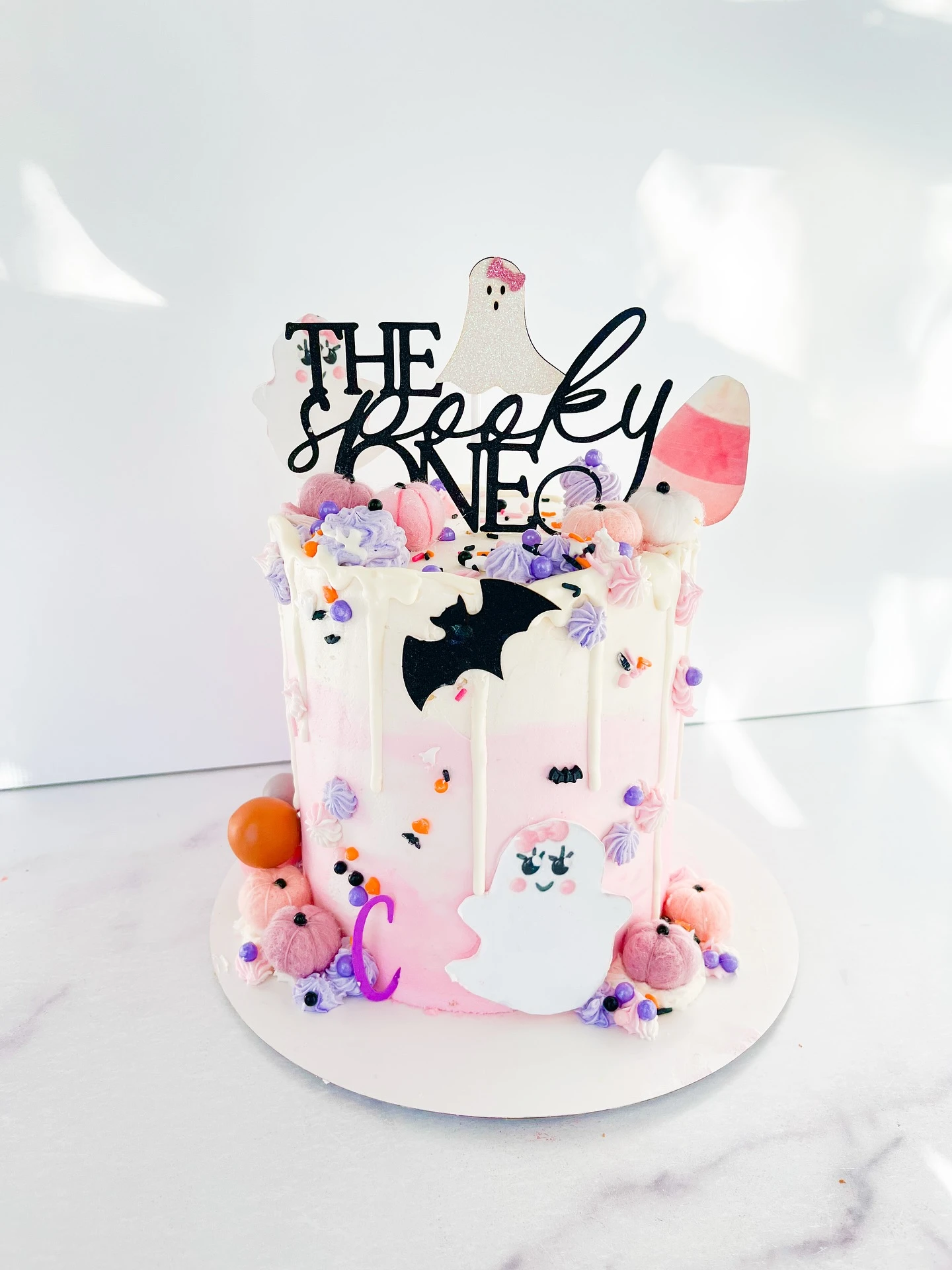 Pastel Ghost Drip Cake spooky one first birthday