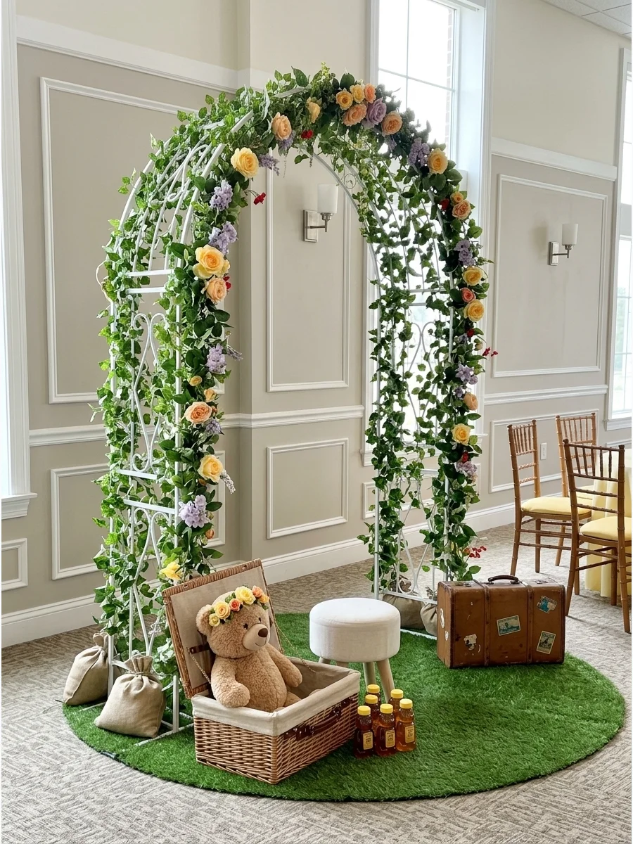 An outdoor garden arch decorated with flowers and a teddy bear in a basket.