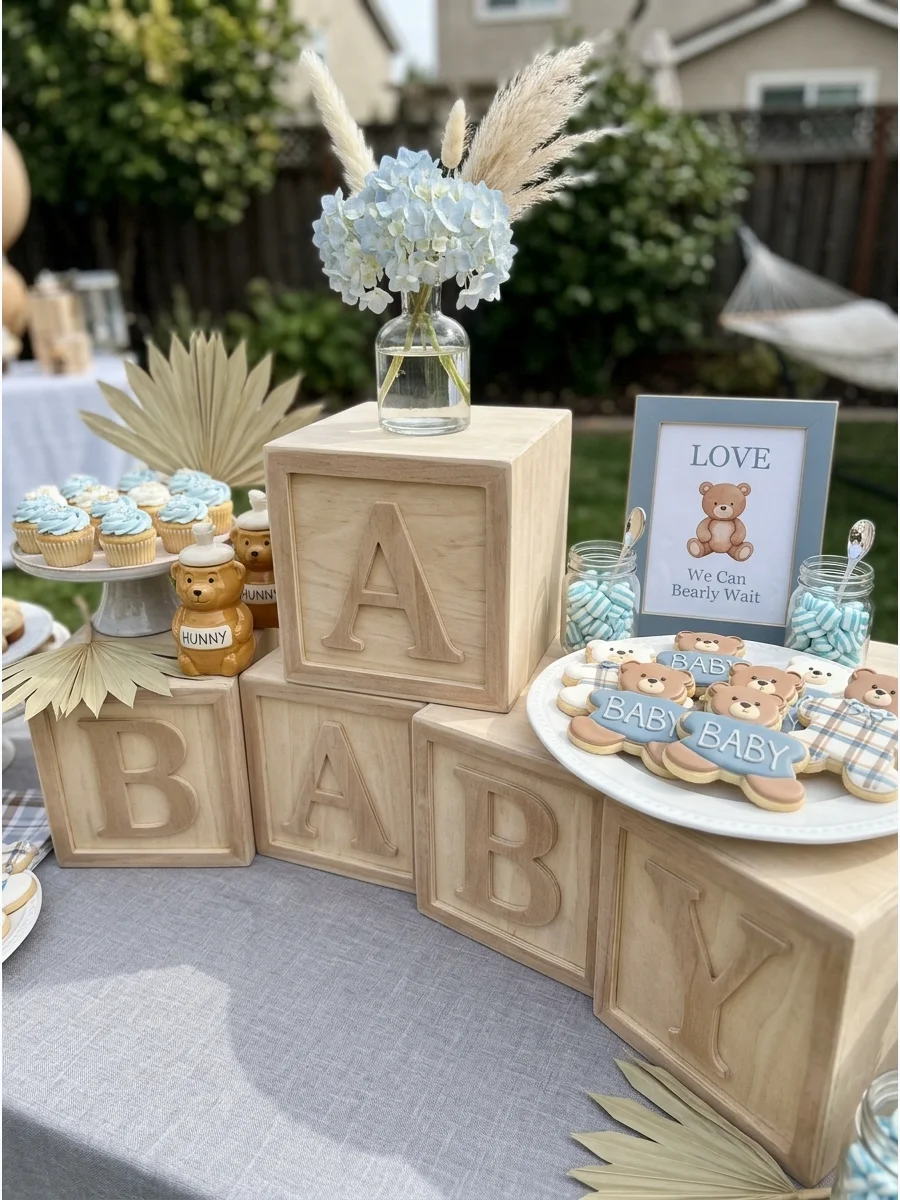 Wooden alphabet blocks used as a display stand for flowers.