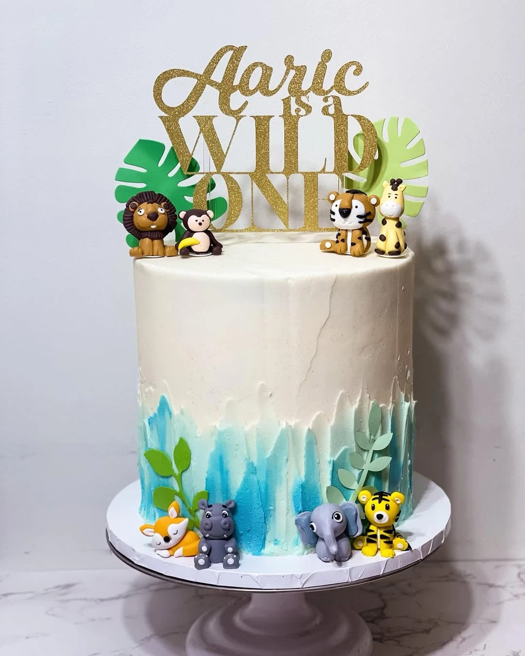Sculpted Animal Cake Accents wild one birthday party boys