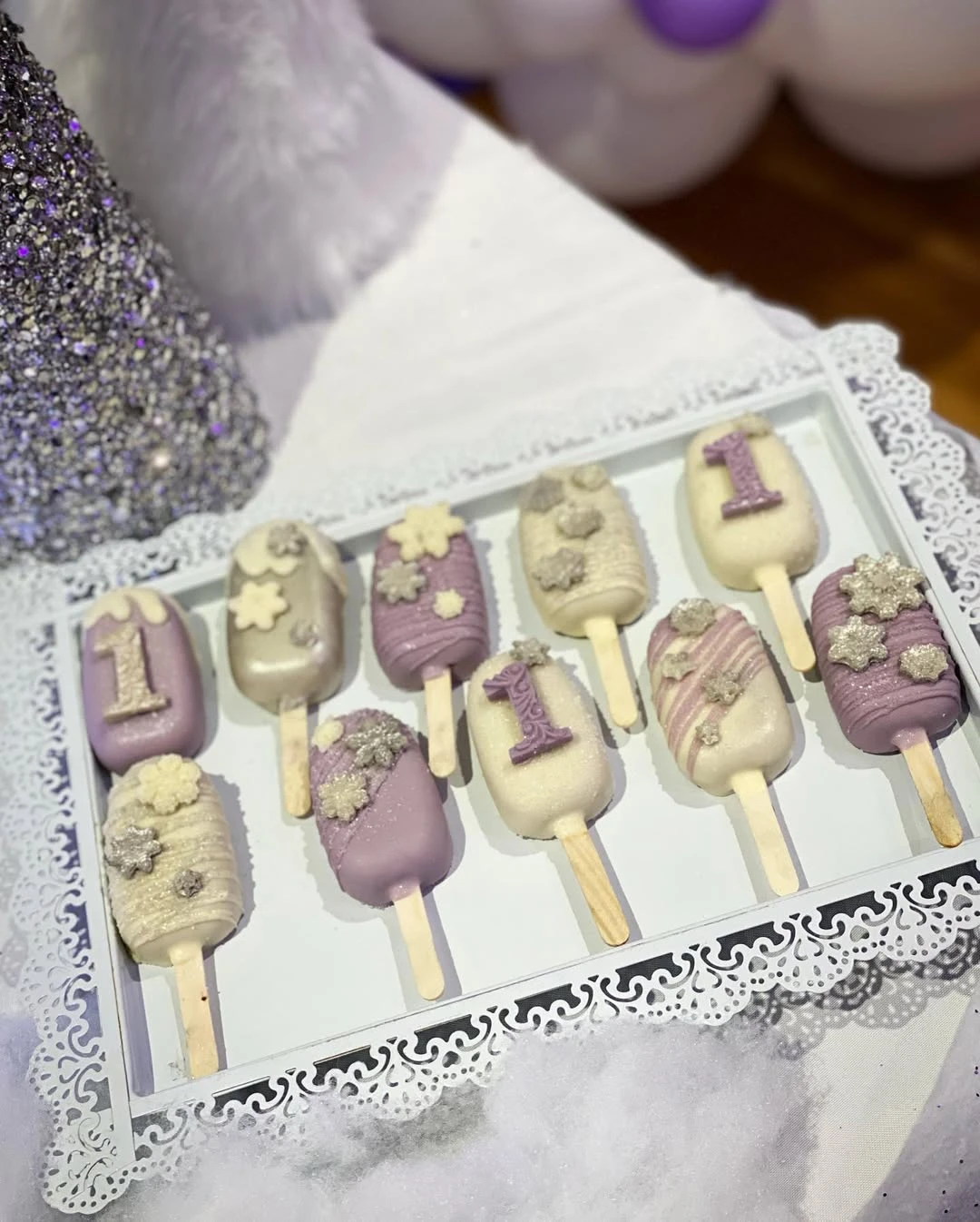 Detailed Winter Theme Cakesicles winter onederland party