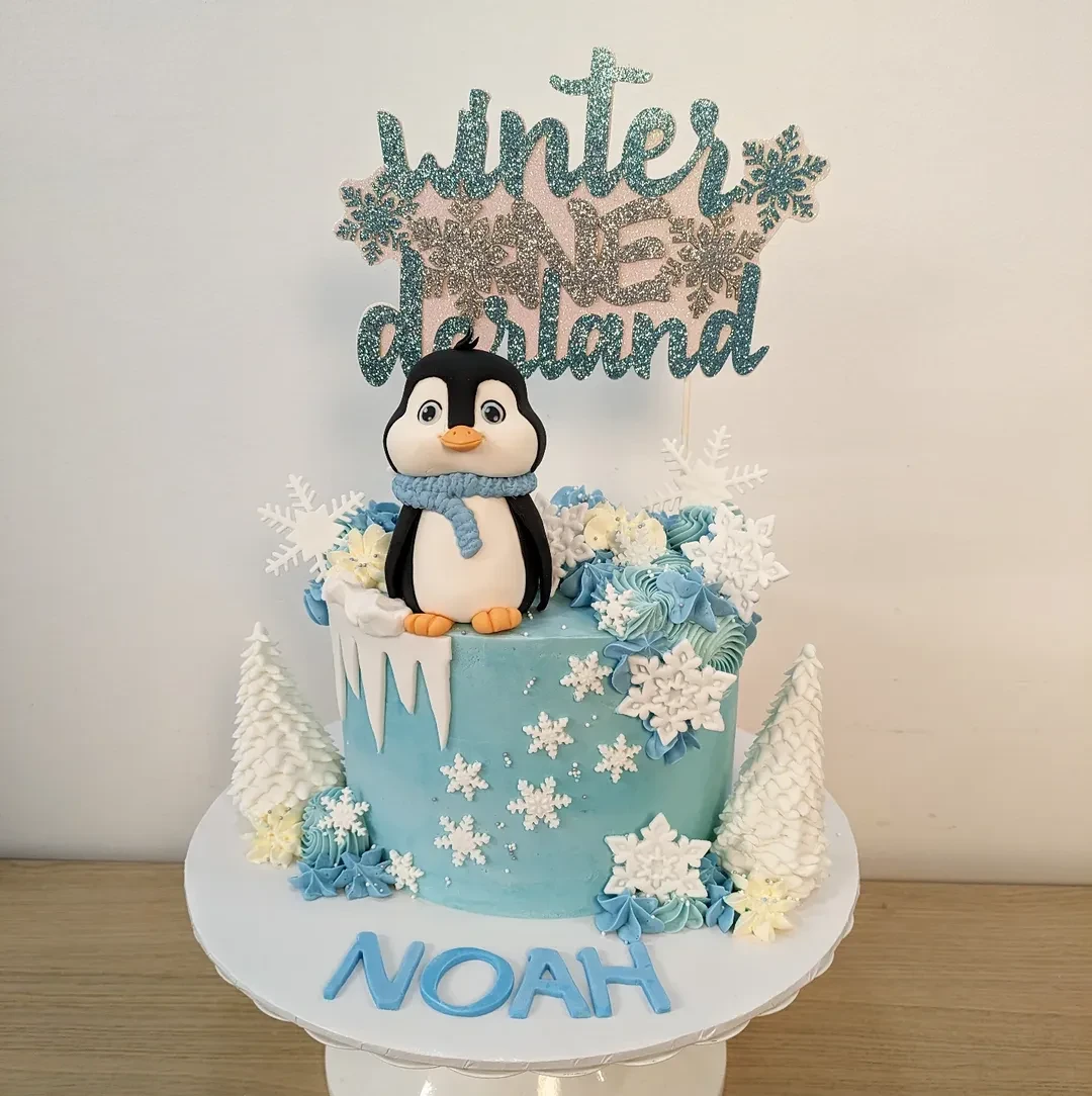 Glittery Penguin Frosting Design winter onederland party