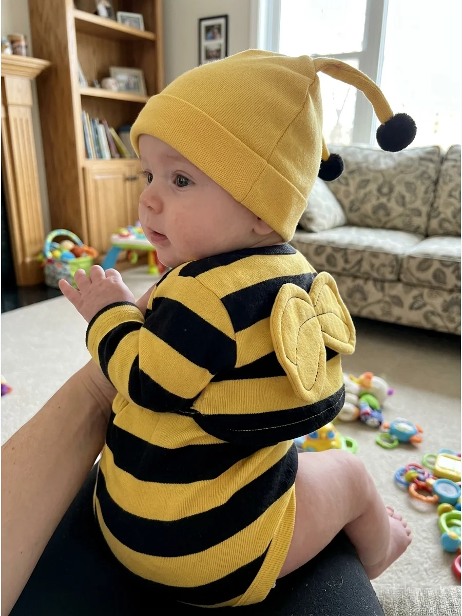 Baby Bumblebee Costume. Use a yellow-and-black striped bodysuit with small fabric wings and a soft antenna hat. Make sure the antenna details are flexible and securely attached. Ba