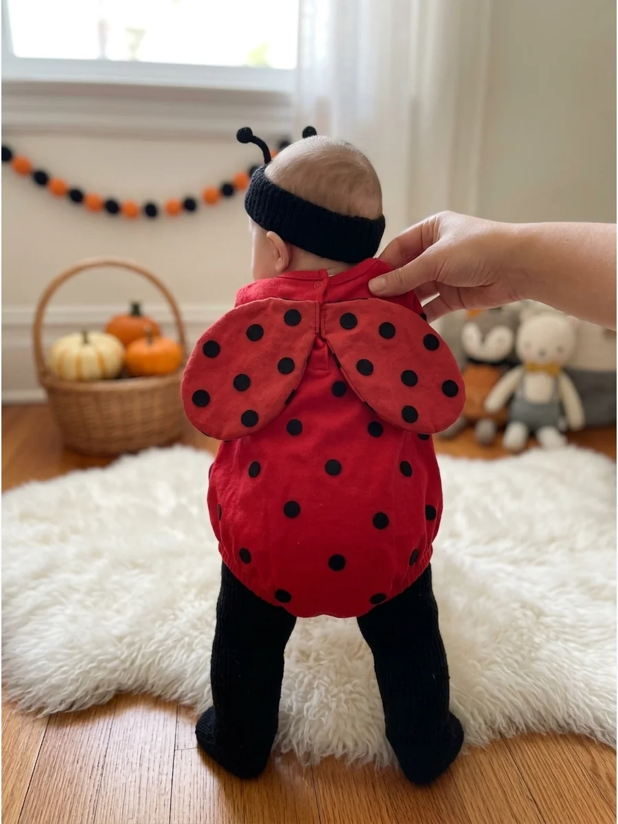 Tiny Ladybug Costume. Pair a red romper with black leggings and soft spotted wings. A simple black headband or hat can finish the look without requiring uncomfortable accessories.
