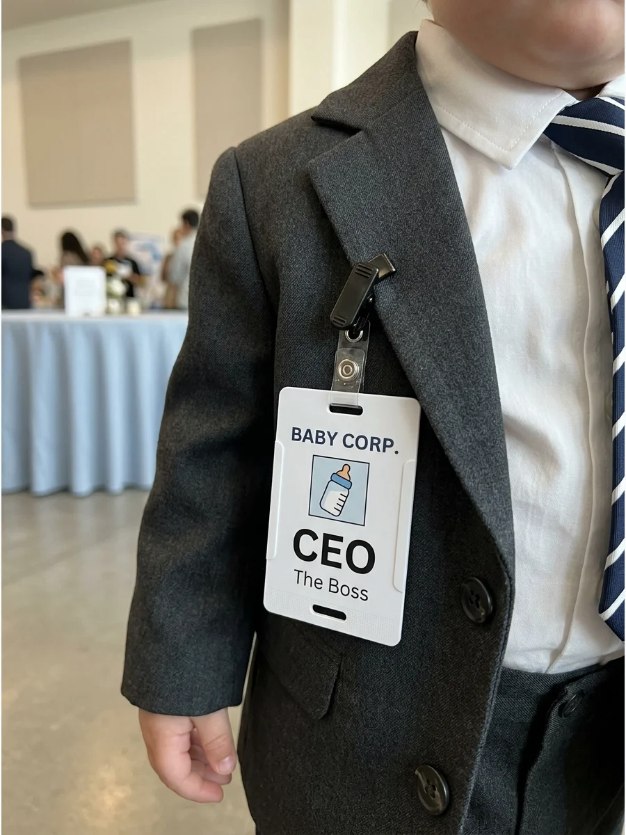 of a baby suit with a CEO ID badge.