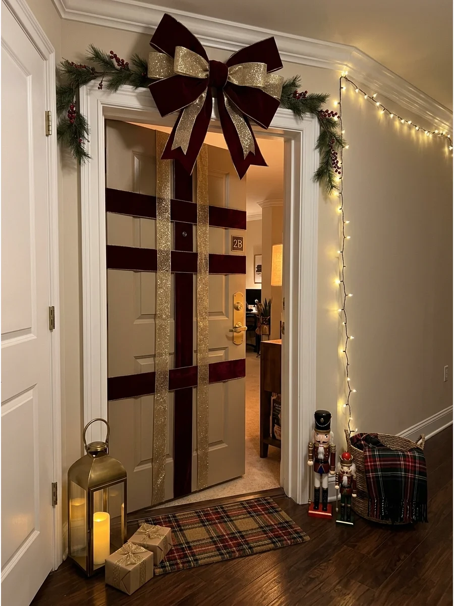 A red door wrapped in gold ribbon like a Christmas present with a large bow.