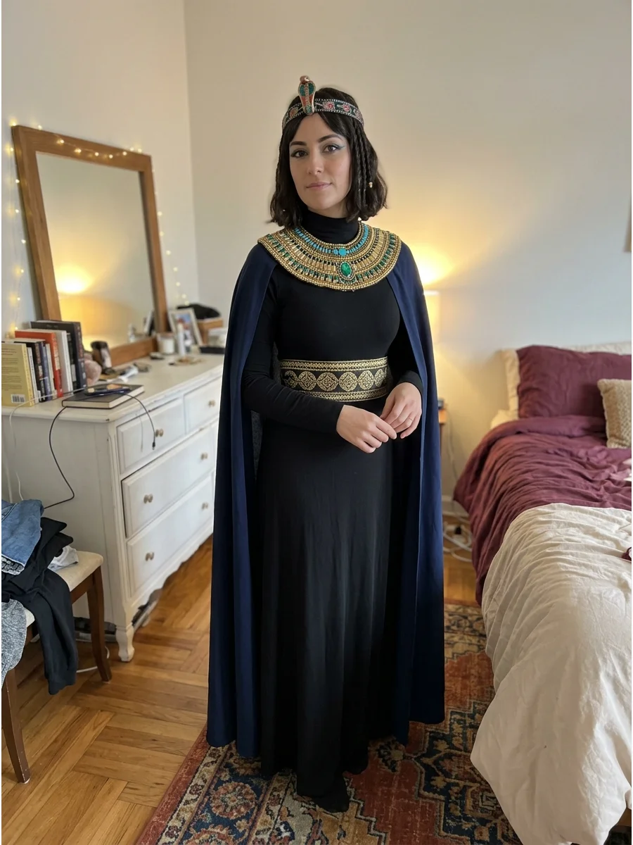 Modest Cleopatra Costume. Combine a high-neck maxi dress with an ornate collar, long cape, gold belt, and decorative headpiece. The costume can remain fully covered while still loo