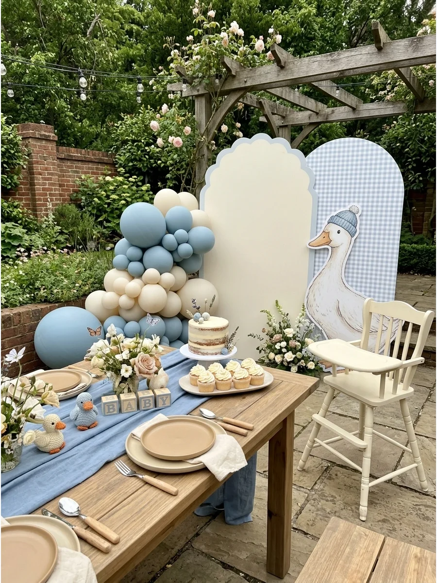 A wooden garden table with a dusty blue runner and tan plates.