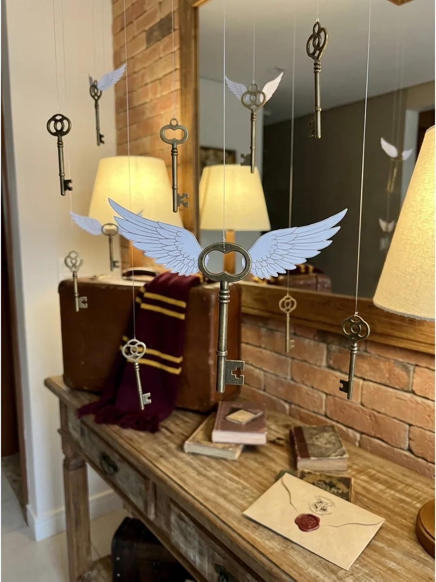 Flying Key Display. Suspend lightweight antique-style keys from clear thread for a subtle nod to the flying-key challenge. Harry Potter Birthday Party Ideas