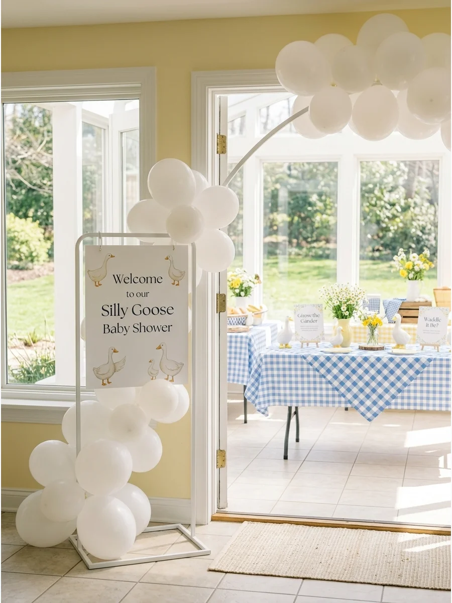Silly goose themed baby shower decor with blue checkered patterns in a sunroom.