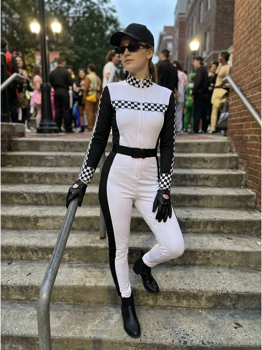 A woman wearing a high-contrast black and white racing suit.