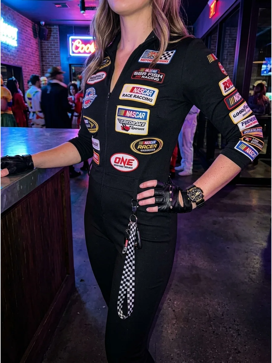 of a black jumpsuit with various racing sponsor patches.