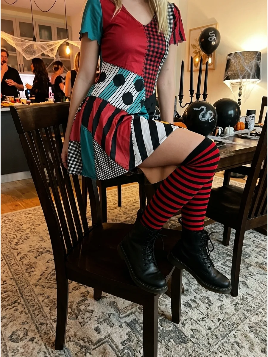 Knee-high striped socks worn as part of a Sally costume.