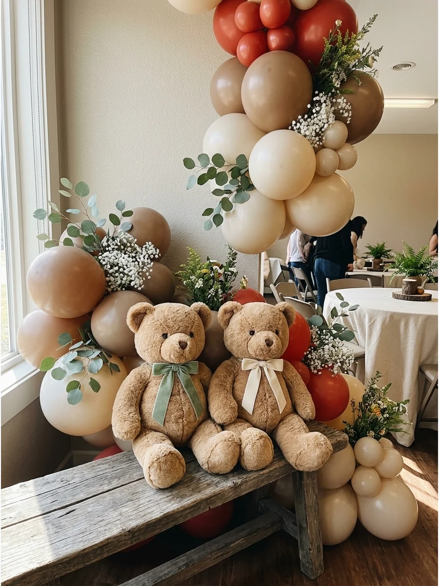 Two teddy bears and balloons used as decor for a twin shower.