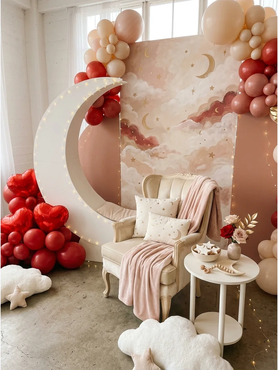 White moon prop with red heart floor balloons.