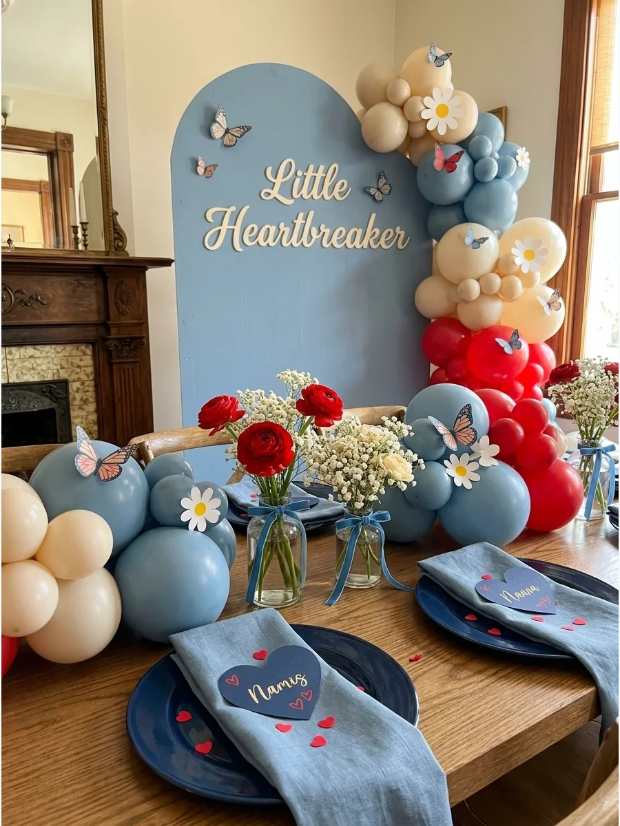 A blue and red Valentine-themed table setting in a private dining room.