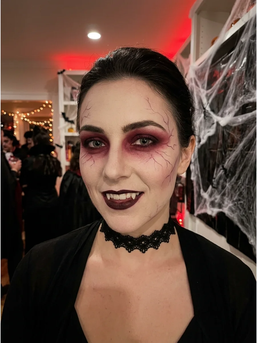 A of vampire makeup featuring burgundy eyeshadow and veins.