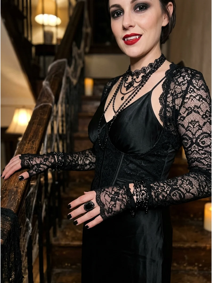 Monochromatic black vampire costume with lace details.