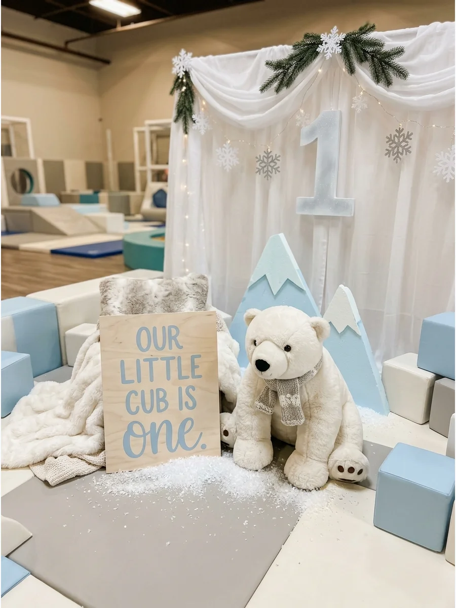 Large plush polar bear and birthday sign in a play area.