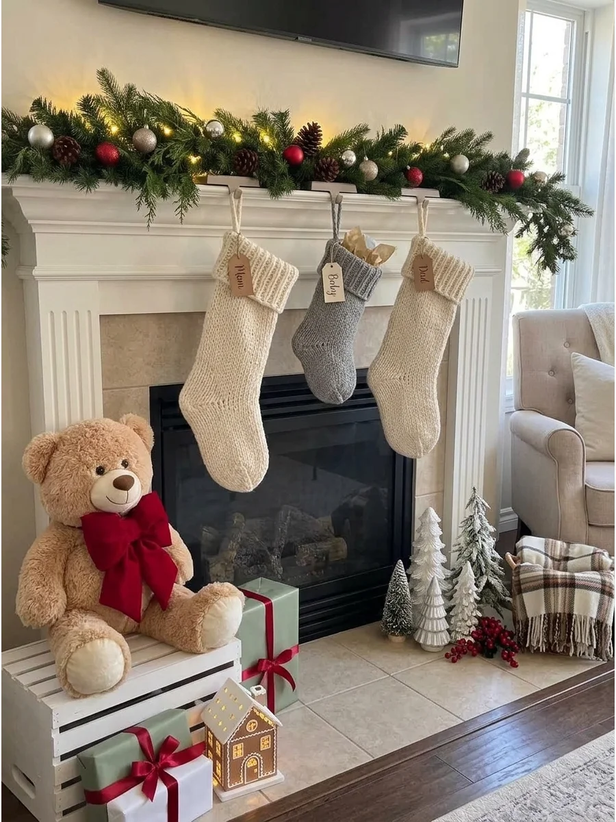 Personalized Christmas stockings hanging on a fireplace mantel.