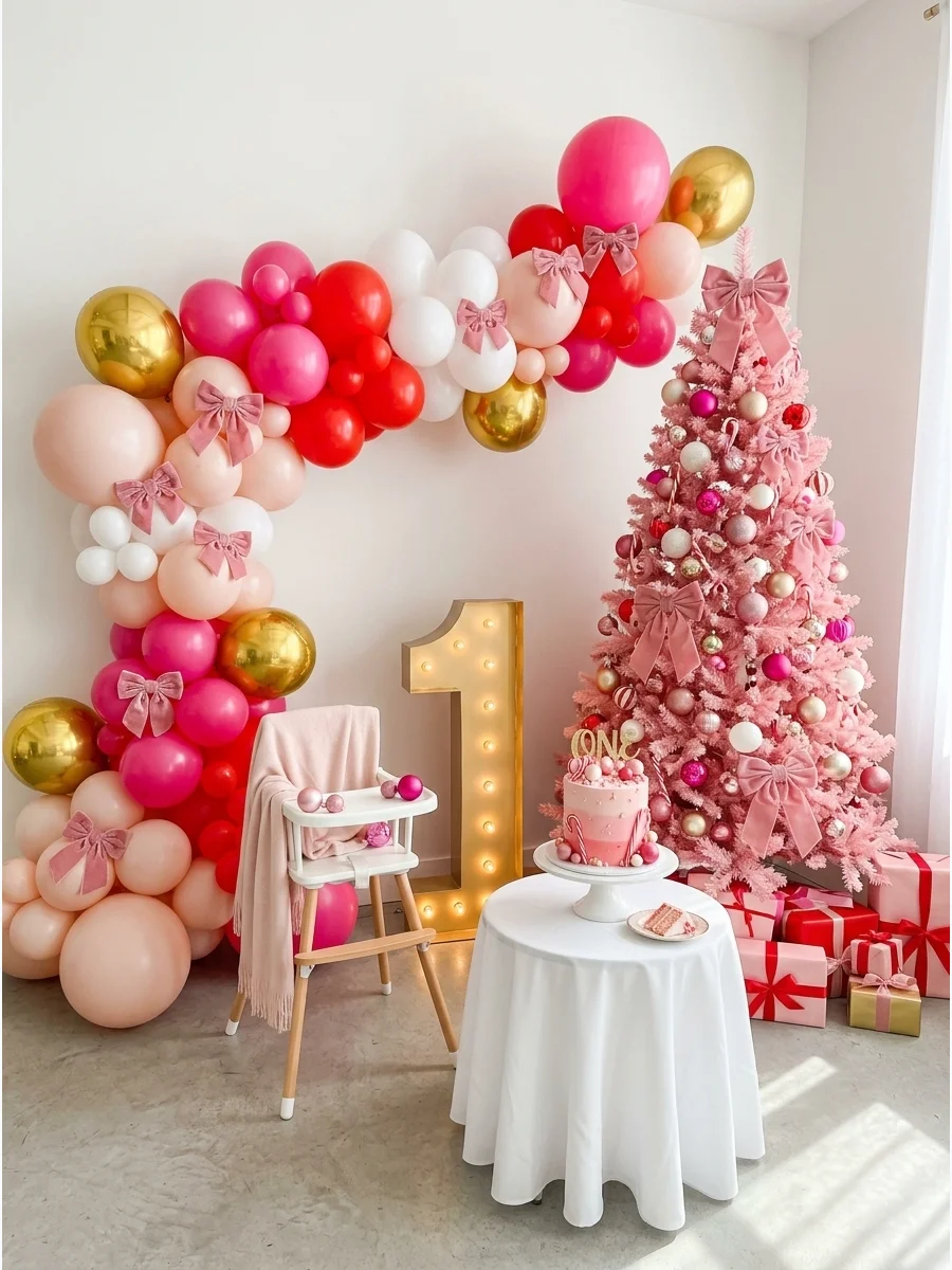 Pink and red Christmas birthday setup with a pink tree.
