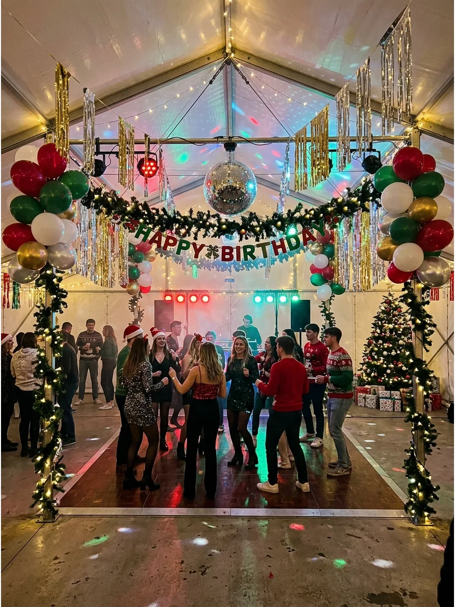 Dance floor in a tent with disco balls and festive balloon decor.