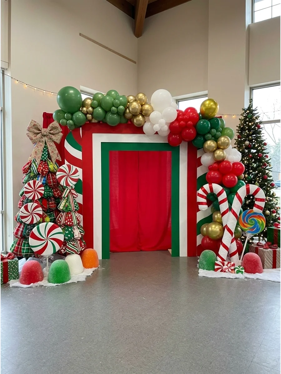 A whimsical Christmas backdrop featuring oversized candy props and colorful trees.