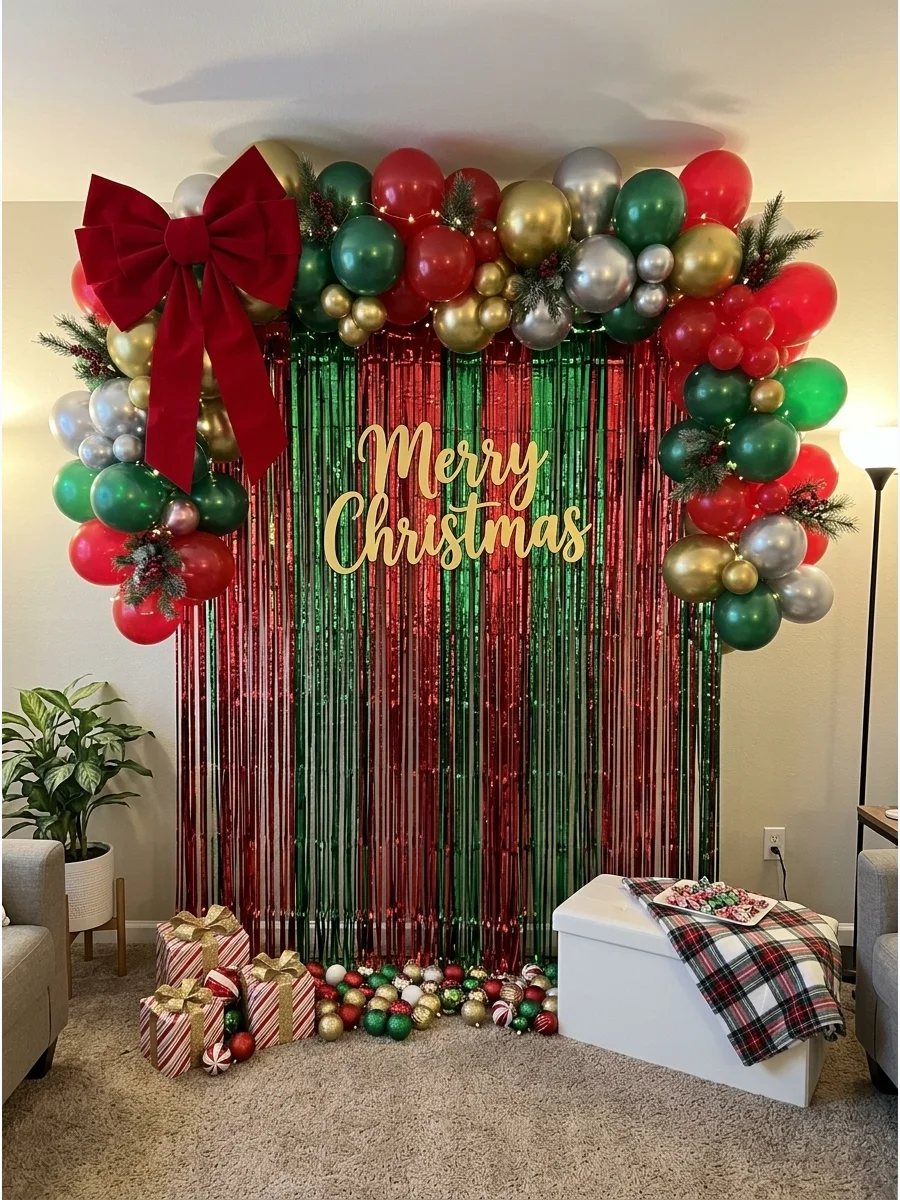 A shiny red and green fringe curtain backdrop with a gold Merry Christmas sign.