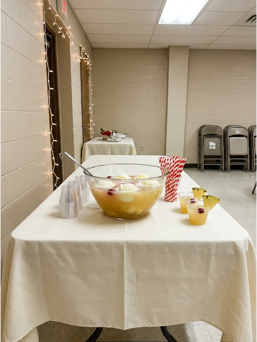 Pineapple sherbet punch in a bowl on a church fellowship table.