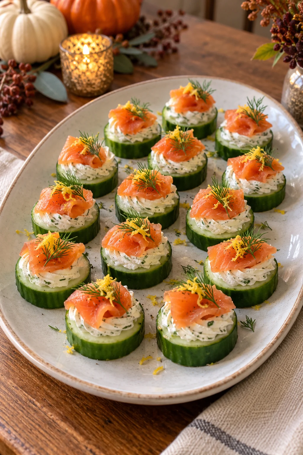 Cucumber rounds topped with herbed cream cheese smoked salmon and dill