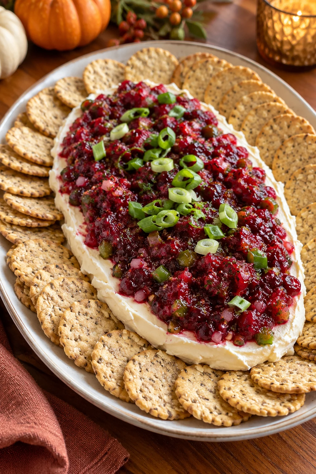 Bright cranberry jalapeno relish layered over cream cheese with crackers