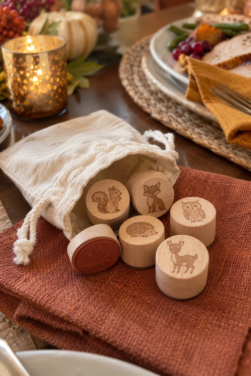 Small wooden woodland animal stamps in a cotton drawstring bag